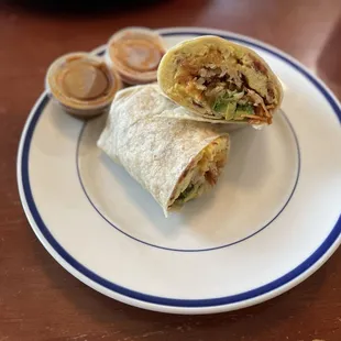 Breakfast Burrito - eggs, bacon, cheese and added hash browns and avocado.
