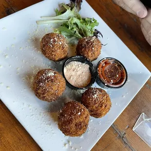 MAC AND CHEESE PUPPIES -  the ranch is spicy and the Mariana reminds me of the original little Ceaser's crazy bread Marinara!