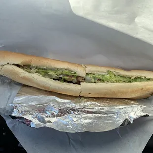 A double fried ham and cheese with mushrooms minus tomatoes.