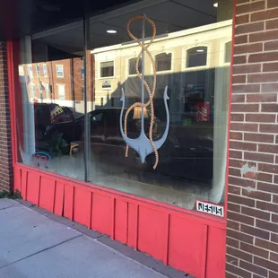 Front of store. It's situated on a corner.