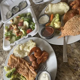 Seafood platter with flounder, stuffed crab, and shrimp.