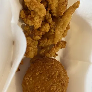 fried shrimp and a burger in a basket