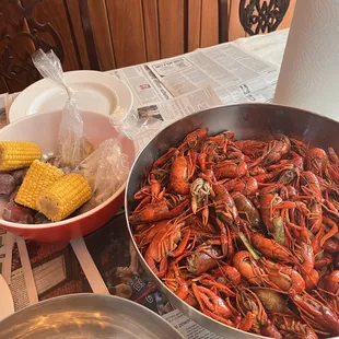 Boiled crawfish, potatoes, corn, and garlic