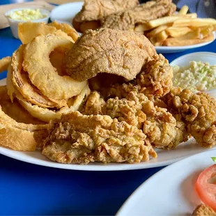 Small Fried Patter with flounder and oysters. Onion rings and Cole slaw.
