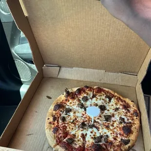 The horrible so called large thin crust pizza that I received