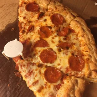 This pizza has only been in our possession for 5 minutes and it's already eaten. Yum