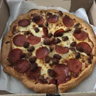 Small pepperoni and sausage pizza