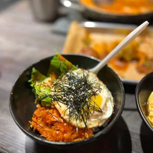 two bowls of food on a table