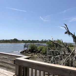 a wooden deck overlooking a body of water