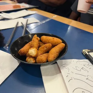 a bowl of fried tater tots
