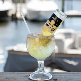 a drink in a glass with a straw