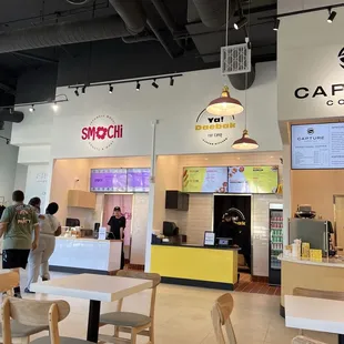 Three different eateries in the plaza.