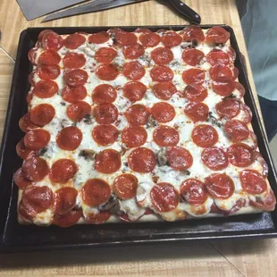 Great looking just out of the oven a large 16 cut pizza