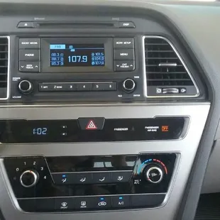 Before, stock stereo and dash. After with Nav unit and back up camera. very clean job !