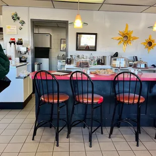 the counter and chairs