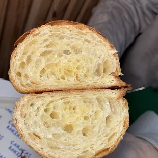 the inside of a croissant sandwich