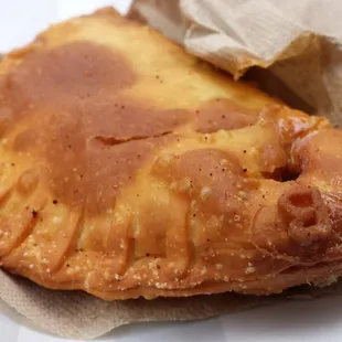 shredded beef and cheese empanada. deep fried deliciousness.