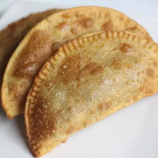 Perfect empanadas! Golden brown, hand-made, filled with deliciousness.