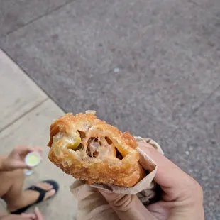 Inside of a beef and cheese