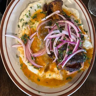 Chamorro Adobado, pork shank with mashed potatoes