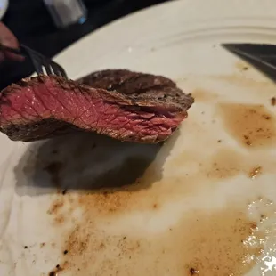 Ask for my steak medium well. Never got service after cutting into it. That&apos;s why my plates empty except for the steak.