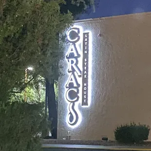 Sign on left side of the hotel entrance
