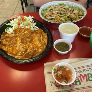 Chicken Cesar Salad and two al&apos;a carts chicken enchiladas.