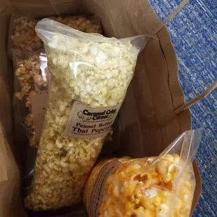 Peanut Butter Thai, Jalapeño Cheddar and Caramel popcorn!