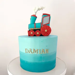 a cake with a train on top