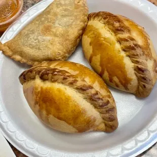 three pastries on a plate