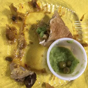 Remains of the empenada and green pepper sauce
