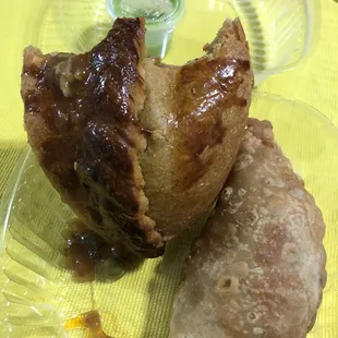 Top is the saltena, bottom is the empenada.
