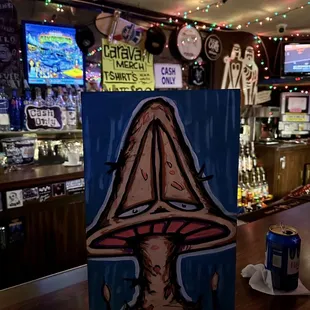 a painting of a mushroom on a table