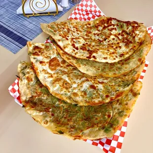 The bolani was delicious--crispy on the outside and stuffed with a flavorful potato filling, perfectly seasoned with spices and herbs.