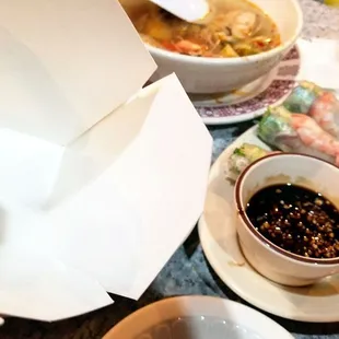 Paper box for spring rolls - to stick to each other and tear upon handling? The awful 3.5 rolls were donated to a squirrel the next morning.