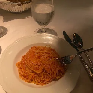 Angel hair pasta with sauce  Bread