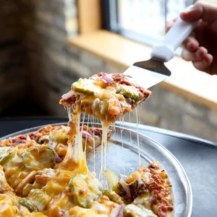 pizza being served
