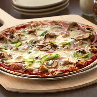 a pizza on a wooden board