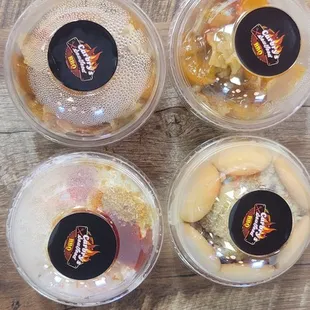 three containers of food on a table