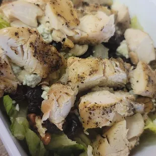 a bowl of chicken and lettuce