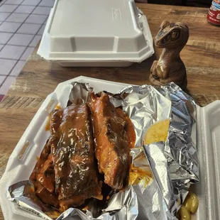 Bob the Raptor says "The Ribs are a real highlight here! Moist prey that falls off the bone!"