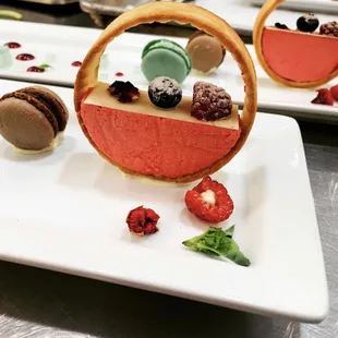 Raspberry mousse cake, basil and chocolate macarons