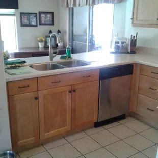 A new under mount stainless steel sink and faucet complete the transformation.