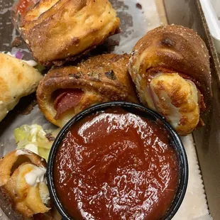 Pepperoni Rolls - with the pizza sauce; like little EXTREME pizzas !