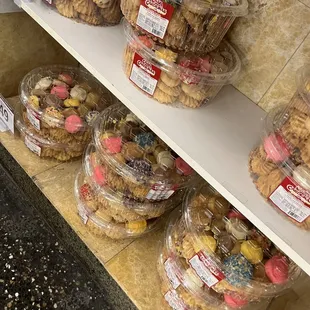 a variety of cookies on shelves