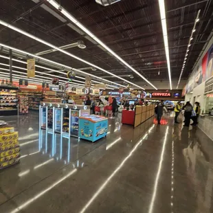 people shopping in a grocery store
