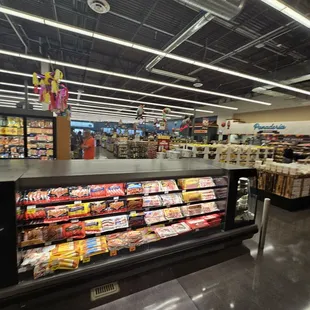a refrigerated section of a grocery store
