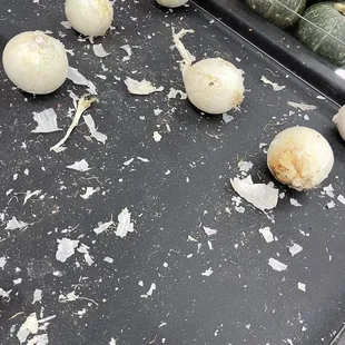 onions and squash on a tray