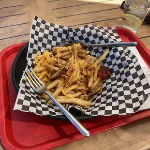 This is the actual portion size of the $15 Gold Digger fries (minus two bites). Much smaller than the picture on the website.