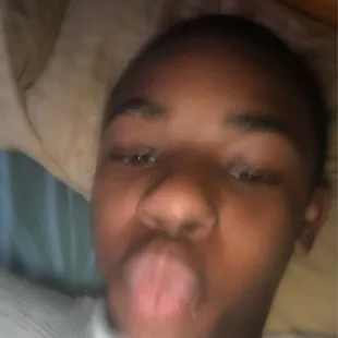 a man sticking out his tongue